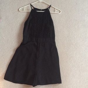 Black romper with zip up back